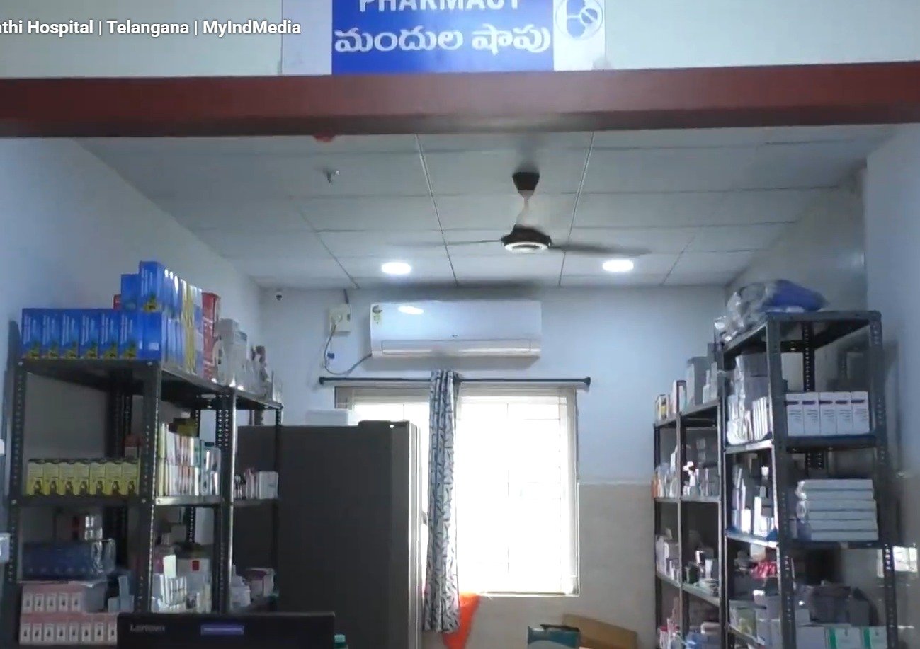 Specialist physician checking patient at Old Mallepally camp