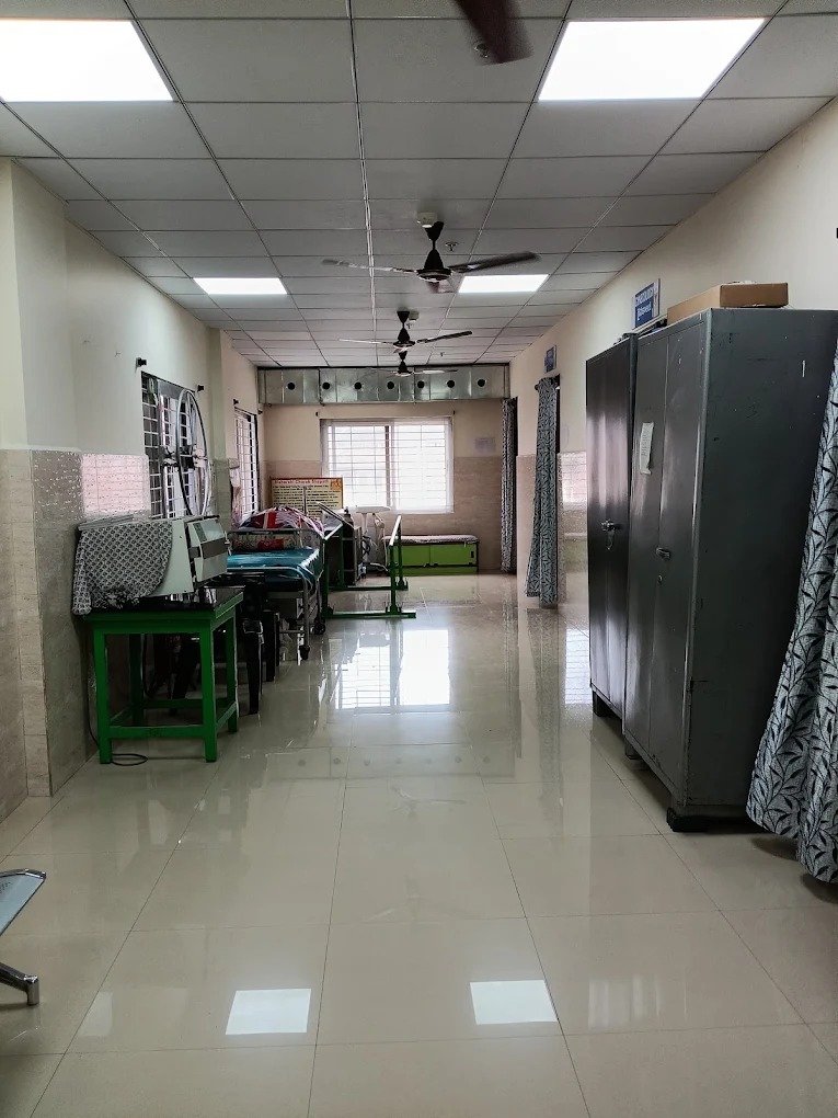 Nurse consulting with a mother and child in inpatient recovery ward