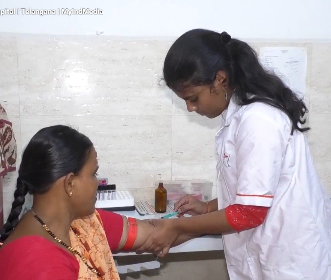 Volunteers and doctors registering walk-in patients
